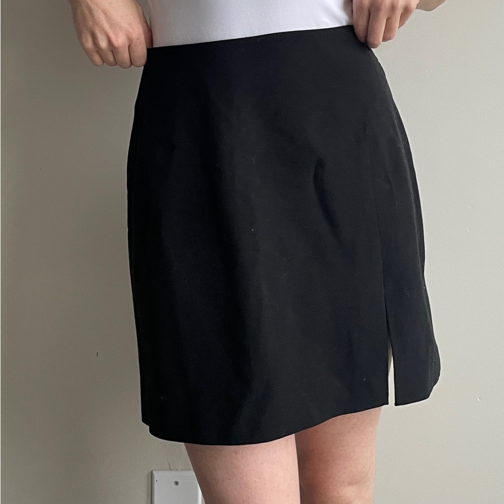 The limited black pencil skirt